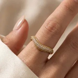 Elegant 18k gold plated stainless steel irregular v-shaped ring with dazzling pavé crystals.