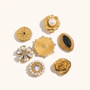 Gold-plated stainless steel brooch buttons set with zircon, pearls, and floral motifs.