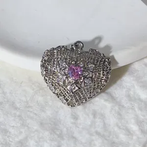 Gold plated micro pave cubic zirconia hollow heart pendant charm for DIY jewelry making.