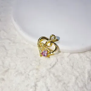 Gold plated Mom heart pendant close-up, micro zirconia paved DIY jewelry accessory detail.