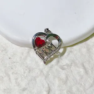 Heart MOM pendant necklace accessory with micro-set cubic zirconia and red crystal stone.