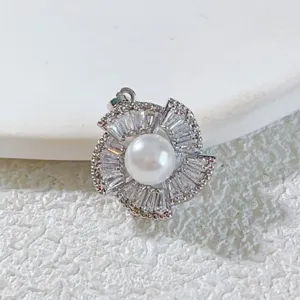 Exquisite pearl zircon swirl pendant detail, elegant silver tone fashion jewelry accessory.