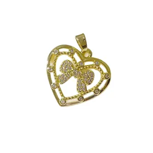 Pendentif cœur en or avec nœud et strass, accessoire de bijoux DIY élégant pour collier.