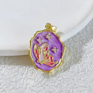 Detailed view of gold-plated purple enamel butterfly pendant with sparkling micro crystal stones.