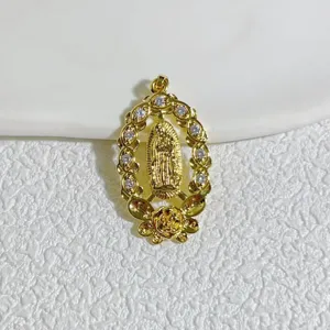 Exquisite copper gold-plated cubic zirconia Virgin Mary pendant detail close-up view.