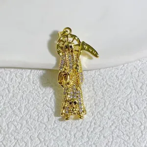 Detailed close-up view of the gold-plated rhinestone paved pendant accessory for DIY jewelry making.