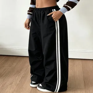 Comodi pantaloni larghi casual con righe laterali bianche, vita alta e morbidi.