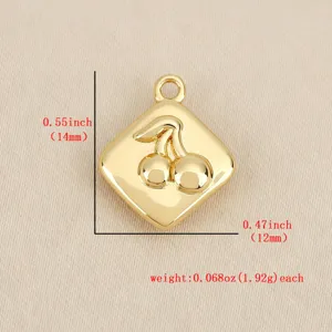 Close up view of gold diamond shaped cherry pendant, highlighting metallic embossed details.