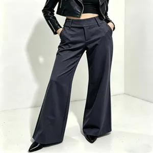 Detailed shot of women's black high waist wide leg trousers, elegant drape and casual style.