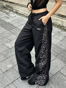 Y2K women wide leg pants with leopard side stripe, black streetwear casual trousers detail.