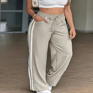 Pantaloni della tuta ampi da donna, con vita elasticizzata con coulisse e strisce laterali.