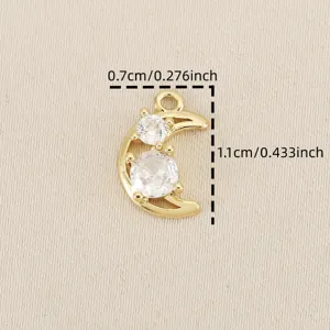 Detail shot of the gold-plated crescent moon pendant with sparkling cubic zirconia stones.