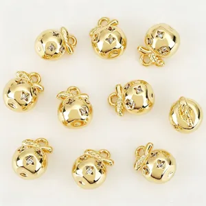 Gold-plated metal apple charms with sparkling zircon stones, perfect for DIY jewelry making.