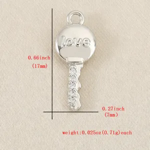 Copper plated rhinestone key pendant DIY jewelry accessory, compact size 0.66 x 0.27 inch each.
