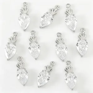 Silver carrot charm pendants set with sparkling zirconia crystals, perfect for DIY jewelry making.