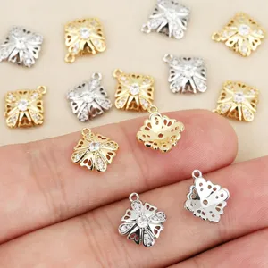 Cuivre plaqué or 18k zircone fleur creuse à quatre pétales pendentifs accessoires bijoux.