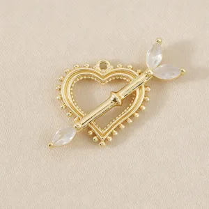 Gold Cupid arrow heart hollow pendant DIY jewelry accessory, delicate crystal detail for crafts.