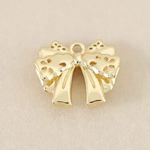 Gold hollow double layer bow pendant, delicate DIY jewelry accessory for handmade necklace.