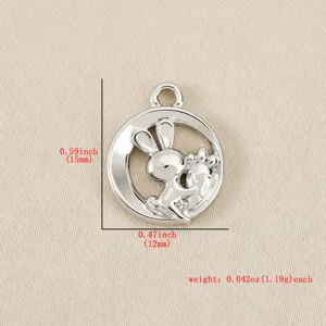 Silver bunny and carrot pendant charm with size and weight dimensions for jewelry making.