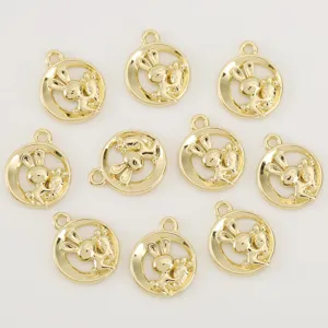 Gold plated hollow rabbit carrot pendant detail, cute metal charm for DIY jewelry making.