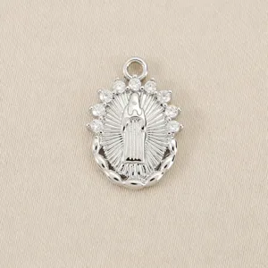 Detail of silver religious portrait pendant with sparkling zirconia stones for DIY.