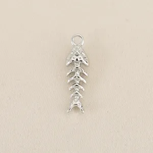 Silver fish bone pendant detail, perfect for DIY jewelry making and custom accessories craftsmanship.