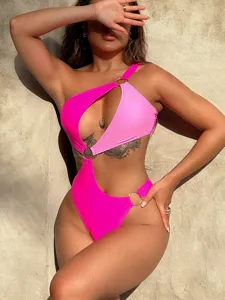 Sexy one-piece swimsuit for women featuring colorblock design, one shoulder and metal rings.