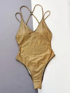 Sexy gold grid one-piece swimsuit for women, trendy v-neck crisscross strap swimwear.