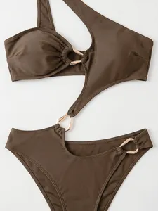 Asymmetrical one-shoulder one-piece swimsuit detail with chic metallic ring accents.