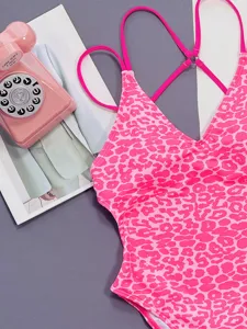 Pink leopard print one-piece swimsuit with thin cross straps for sexy beachwear