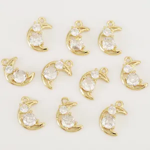 Details of the 18k gold plated brass moon pendant set with sparkling cubic zirconia.