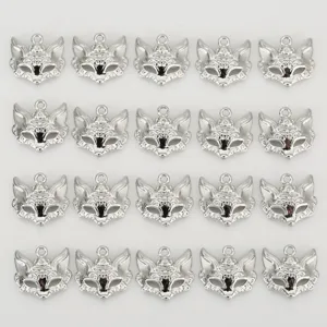 Silver fox mask DIY pendant, intricate metal charm for jewelry making accessories detailed shot.