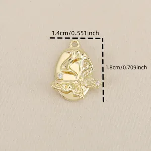 Gold plated oval pendant detail, geometric relief bow design with sparkling cubic zirconia.