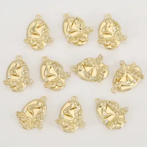 Detailed close-up shot of gold plated copper geometric relief bow pendant DIY jewelry components