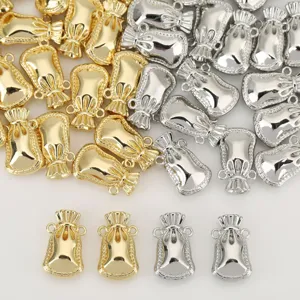 Gold and silver tone lucky money bag metal charms, detailed drawstring design DIY jewelry findings.
