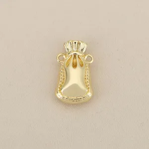 Gold lucky bag pendant detail shot, fine rope pattern metal DIY jewelry accessory