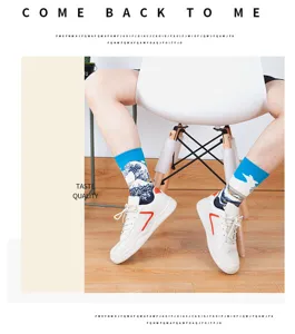 Close-up detail of retro oil painting print mid-tube socks worn with sneakers in lifestyle scene.