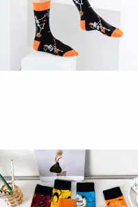 Halloween mid-calf socks with funny skeleton and pumpkin patterns, comfortable cotton casual wear.