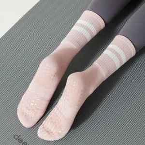 Non-slip grip yoga socks for women, cotton mid-calf pilates fitness socks with cute stripes.