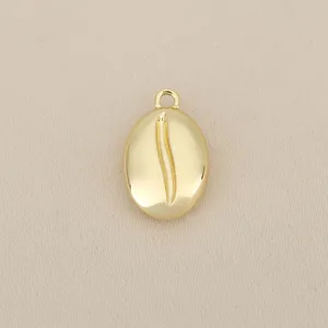 Exquisite gold coffee bean pendant charm, detailed view of DIY jewelry accessory.