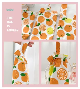 Tragbare Canvas-Becherhülle mit frischem Orangen-Muster und praktischem Kordelzug.