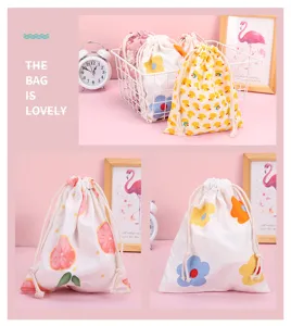Carina borsa di stoccaggio con coulisse in cotone con stampe, ideale per viaggi.