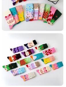 Close up view of colorful ice cream pattern novelty socks detail flatlay design showcase.