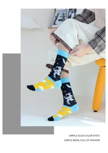 Trendy crew socks with astronaut and spaceship print, colorful design for daily wear.