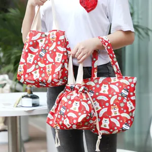 Japanese style red canvas bento bag and lunch tote set with cute shiba inu patterns.