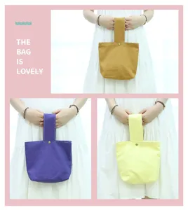 Minimalist solid canvas handbag for women, casual wrist bag for phone and small items daily.