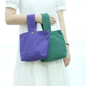 Minimalist solid color canvas wrist bag, casual small handbag for women daily shopping and stroll.