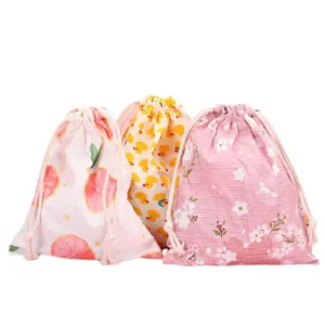 Sacchetti portaoggetti con coulisse in cotone carino con stampe di frutta e fiori per viaggi.