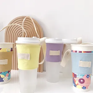 Tragbare Leinen Tassenhülle mit Griff, bunte Farben für Kaffee, Milchtee und Getränke Detail.