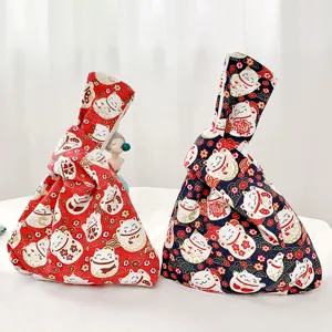 Japanischer Knoten Handtasche Detail, niedliche Winkekatze Leinwand Geldbörse Handytasche.